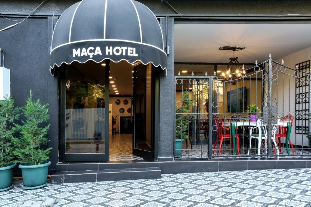 a maza hotel with a sign on the front of a building at MAÇA OTEL in Edirne