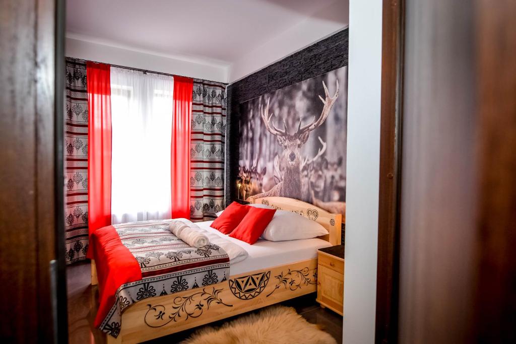 Postel nebo postele na pokoji v ubytování "CZARNA TURNIA"-Apartamenty