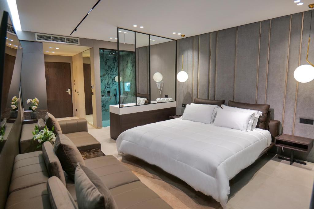 Postel nebo postele na pokoji v ubytování Hotel Miramare