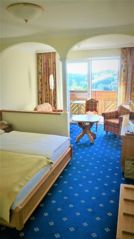 Postel nebo postele na pokoji v ubytování Hotel - Café - Konditorei Schröckmayr-Kastner