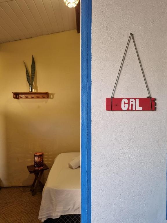 Postel nebo postele na pokoji v ubytování Tropicália Hostel e Pousada