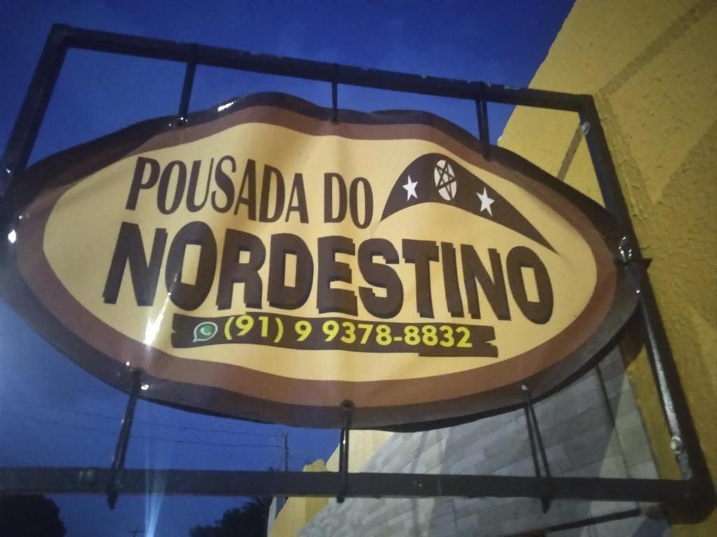 a sign for a pueblo do nocrosuing restaurant at Pousada Nordestino próx ATALAIA in Salinópolis