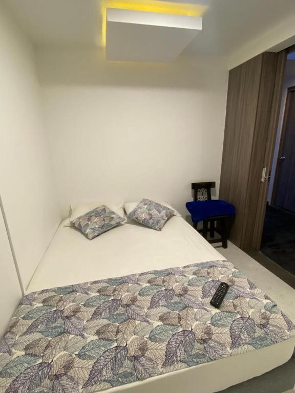 Letto o letti in una camera di Hotel Encanto Filandia