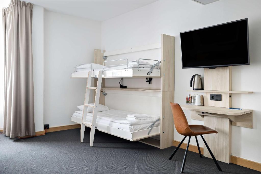 Postel nebo postele na pokoji v ubytování Best Western Hotel Svava