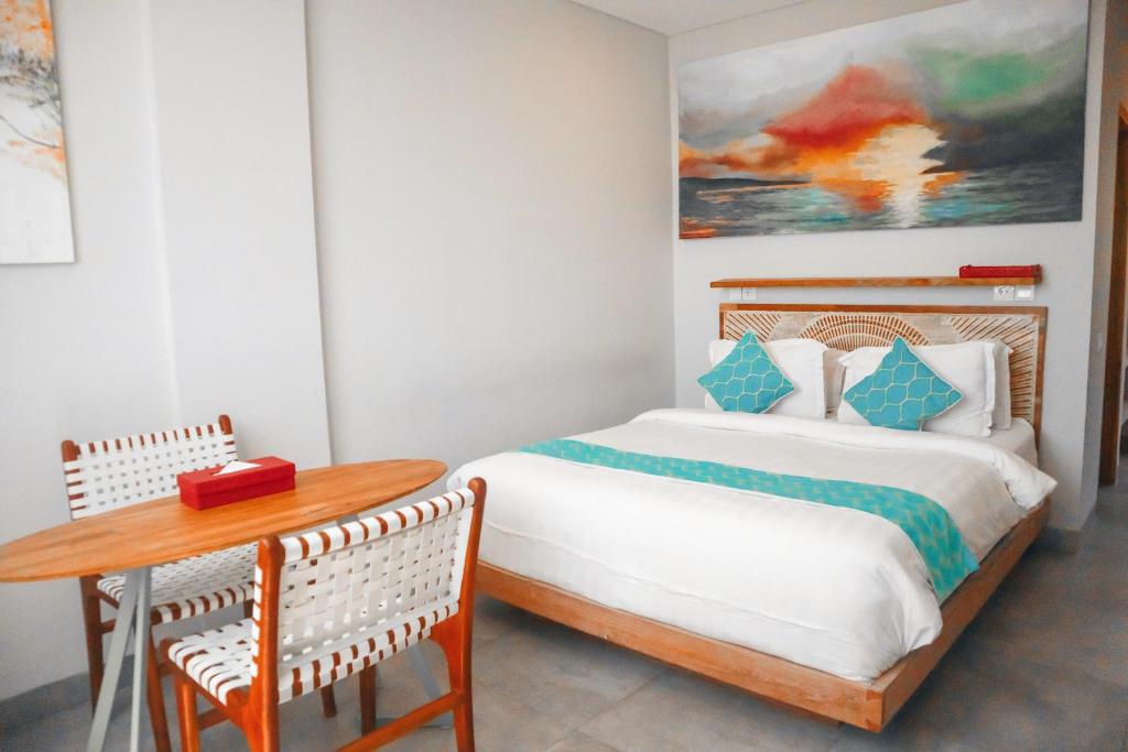 Harbour Komodo Hotel房間的床