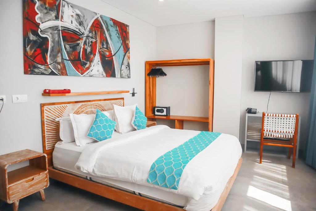 Harbour Komodo Hotel房間的床