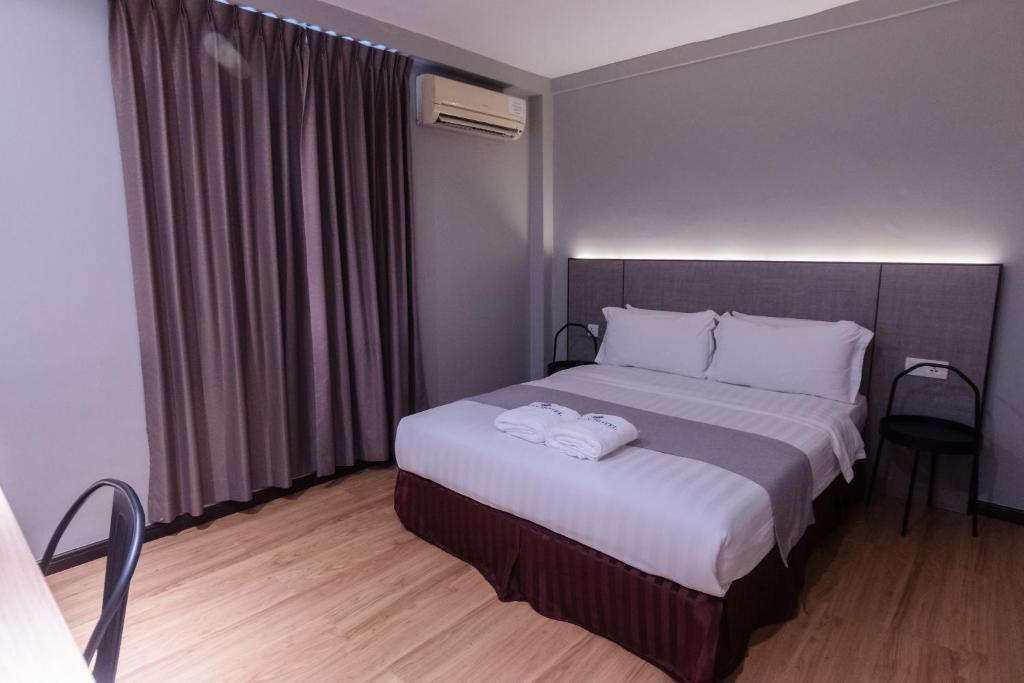 Postel nebo postele na pokoji v ubytování OCEAN HOTEL