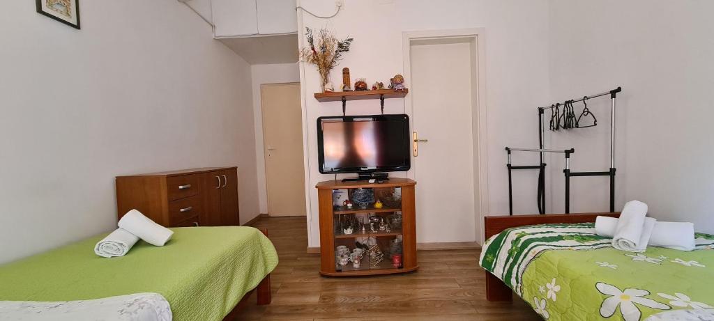 Posteľ alebo postele v izbe v ubytovaní Apartment Close to the beach