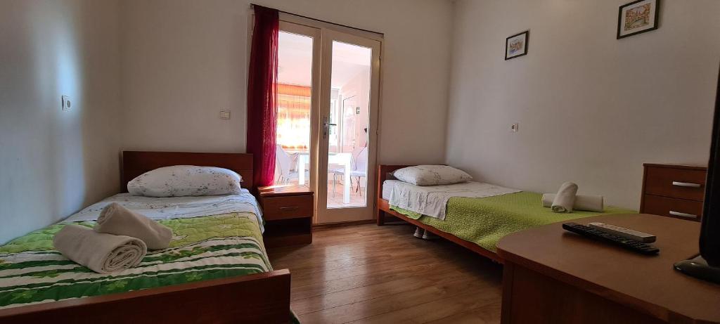 Posteľ alebo postele v izbe v ubytovaní Apartment Close to the beach