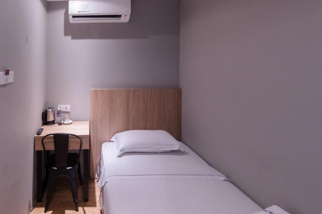 Postel nebo postele na pokoji v ubytování OCEAN HOTEL