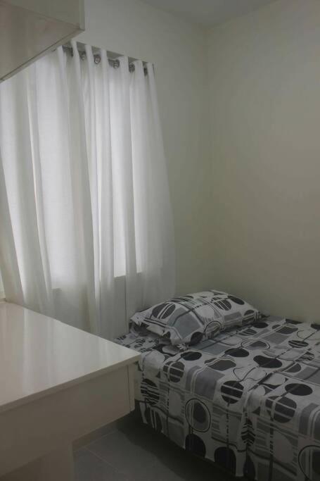 Postel nebo postele na pokoji v ubytování Pontefino Prime Townhouse 4BR with Wifi & Pool