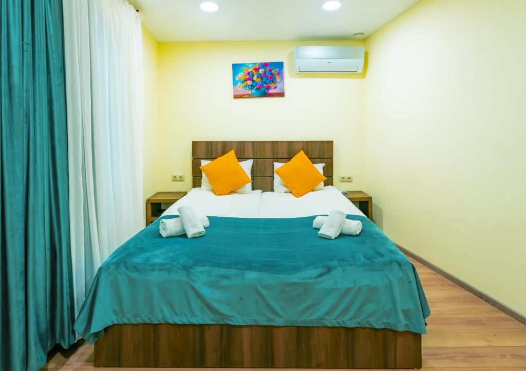 Postel nebo postele na pokoji v ubytování Hotel Classic Suites