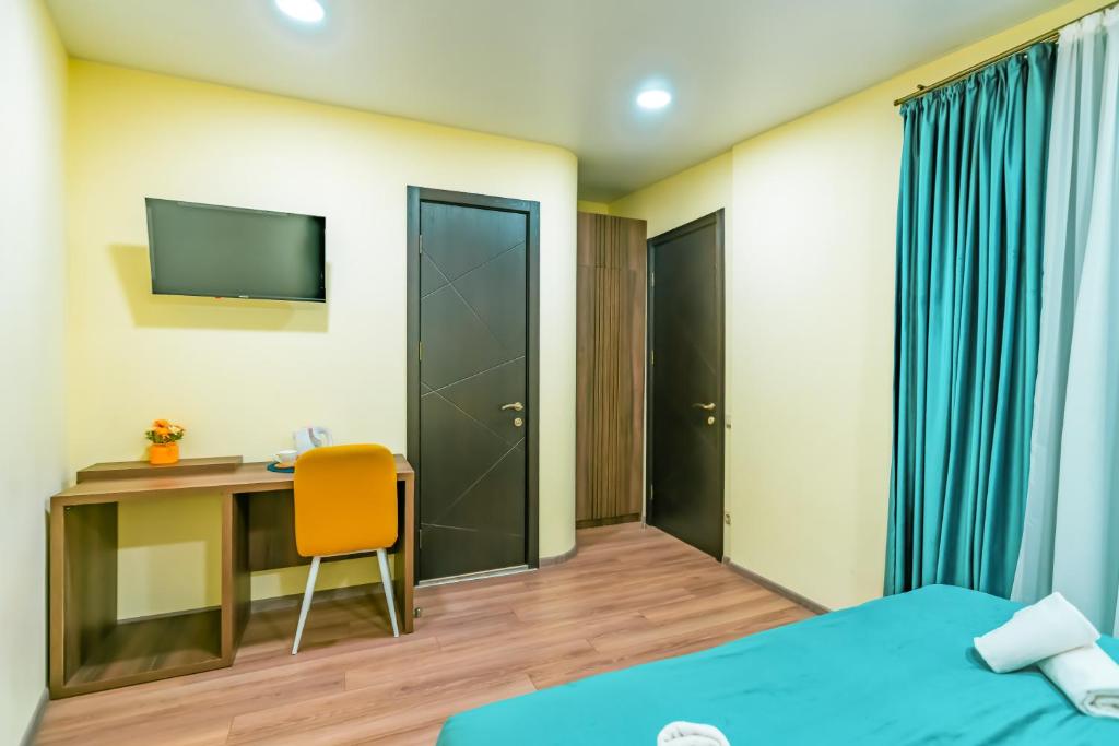 Postel nebo postele na pokoji v ubytování Hotel Classic Suites