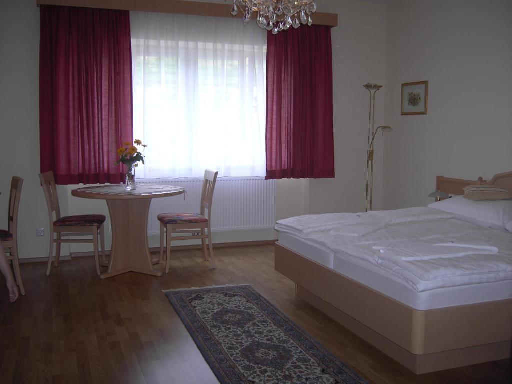 Postel nebo postele na pokoji v ubytování GästeHaus Rudolf u. Sandra DENK