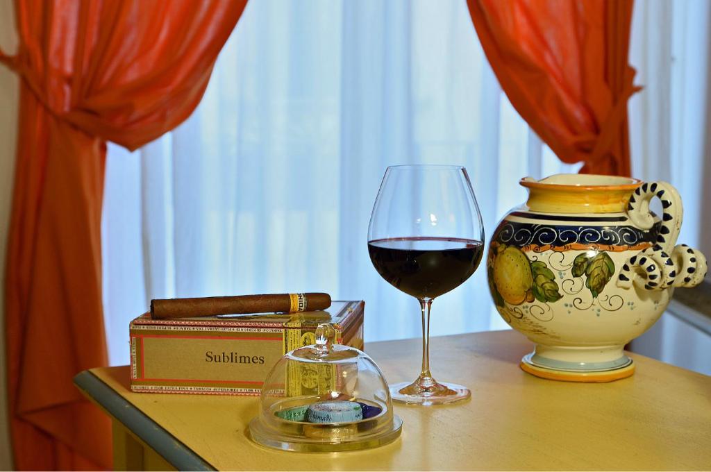 Nápoje v ubytování Hotel Vasari