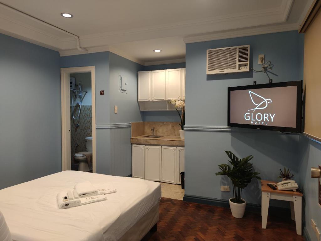 Kuchyň nebo kuchyňský kout v ubytování Glory Hotel Cubao