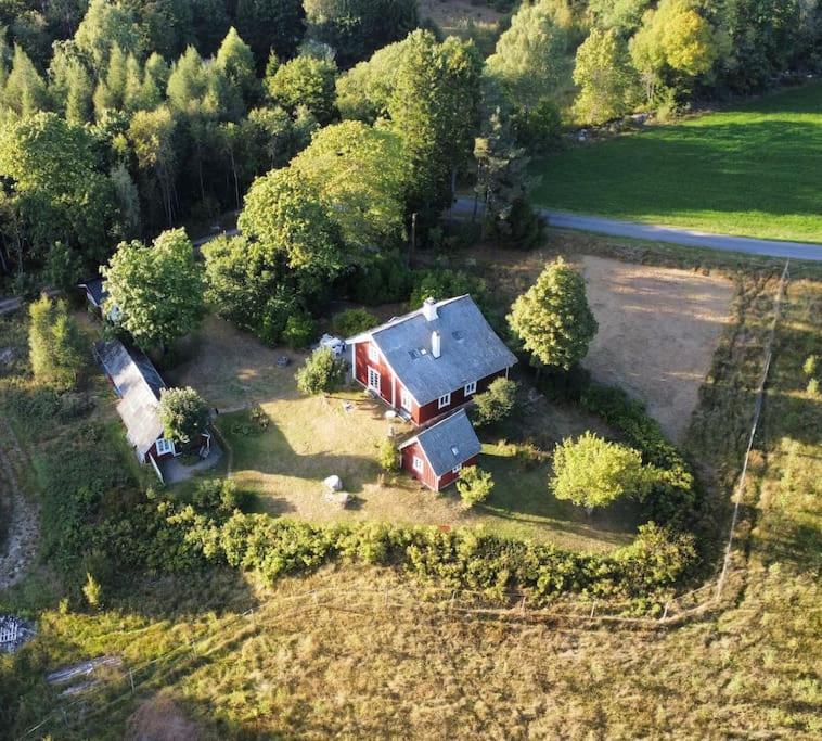 an aerial view of a house in a field at Södragården - traditionally Swedish in Annerstad