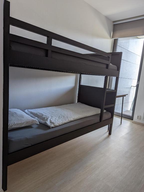 Postel nebo postele na pokoji v ubytování Apartmány KLÍNOVEC - Apartment KEILBERG