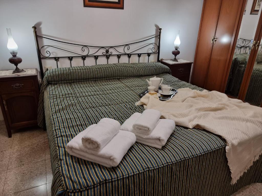 Posteľ alebo postele v izbe v ubytovaní LA FUENTE ROMANA