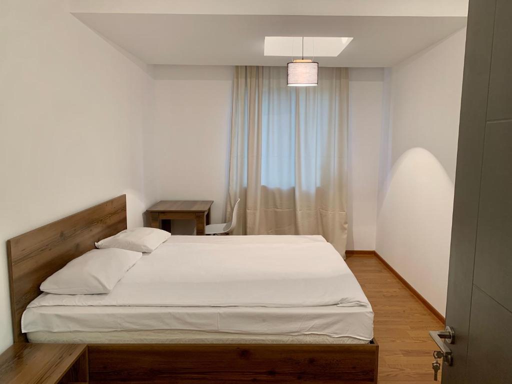 Postel nebo postele na pokoji v ubytování One Day Hostel