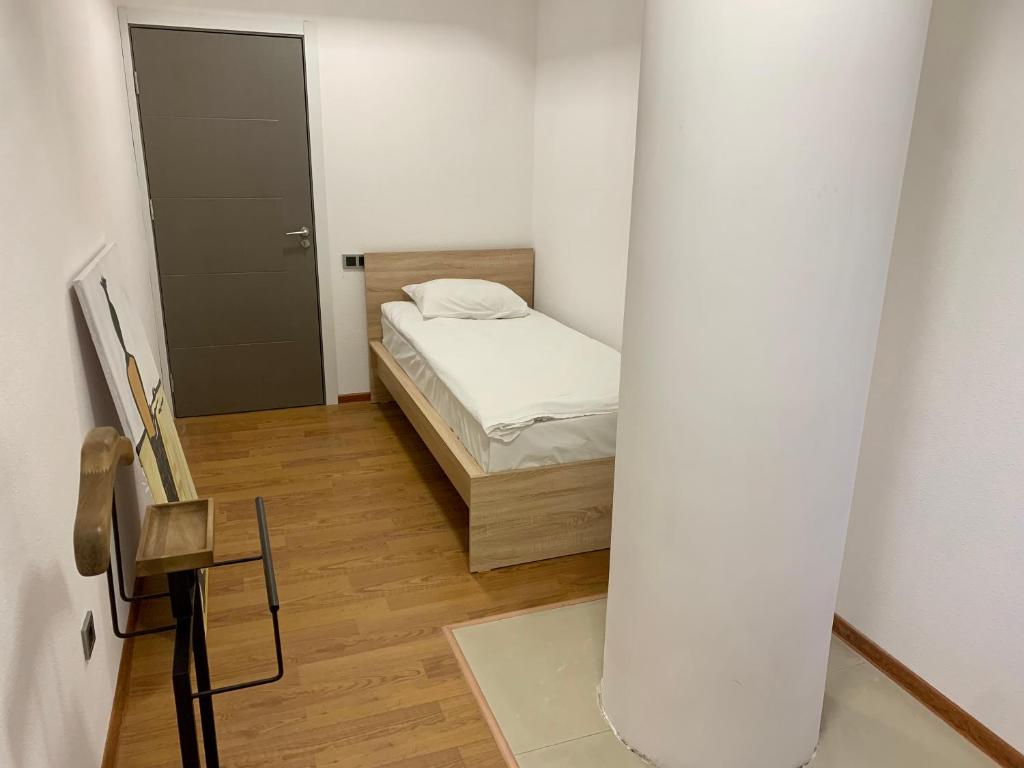 Postel nebo postele na pokoji v ubytování One Day Hostel