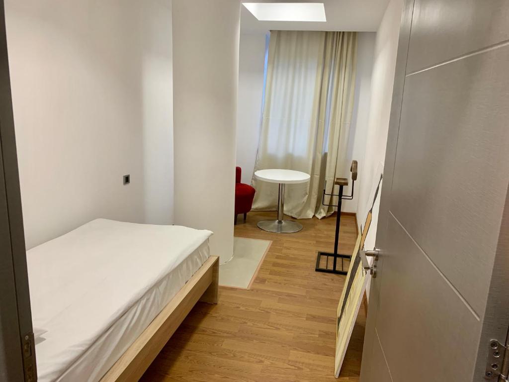 Postel nebo postele na pokoji v ubytování One Day Hostel