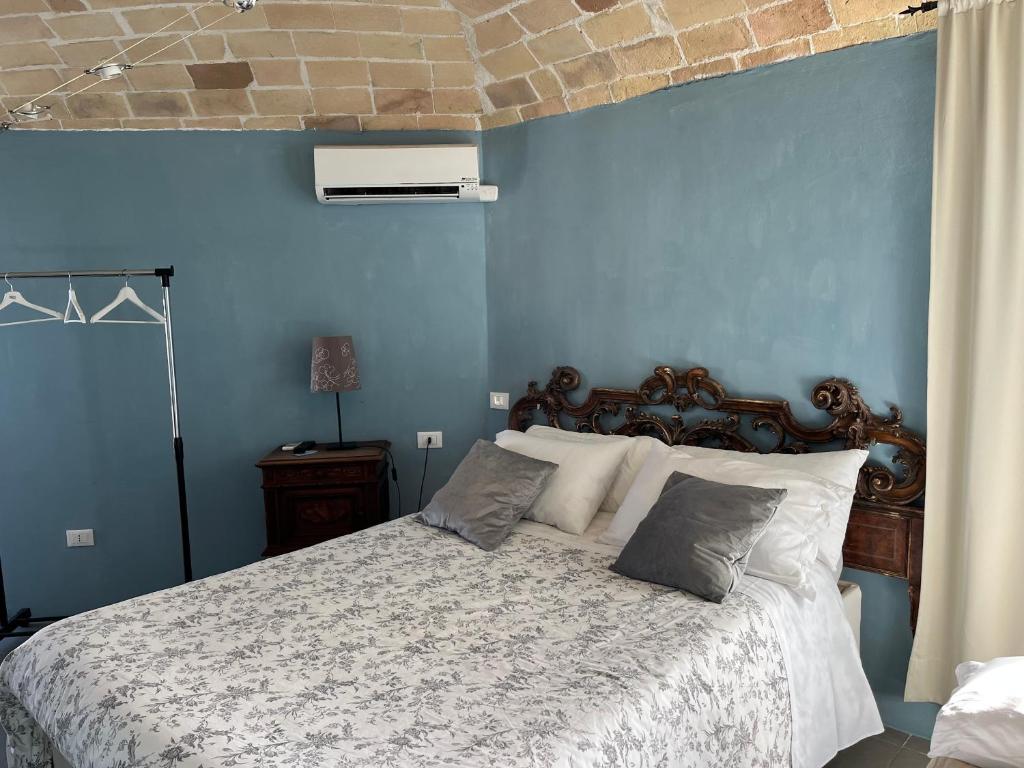 Posteľ alebo postele v izbe v ubytovaní B&B La Terrazza Sul Borgo