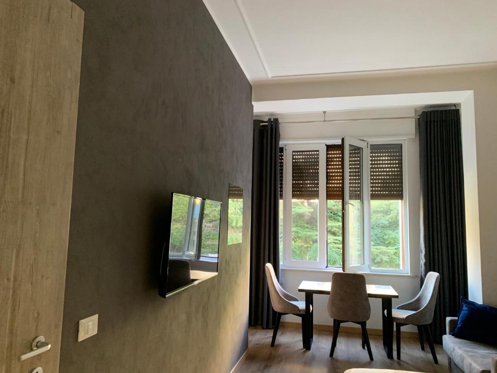 Televízia a/alebo spoločenská miestnosť v ubytovaní B&B Crocevia
