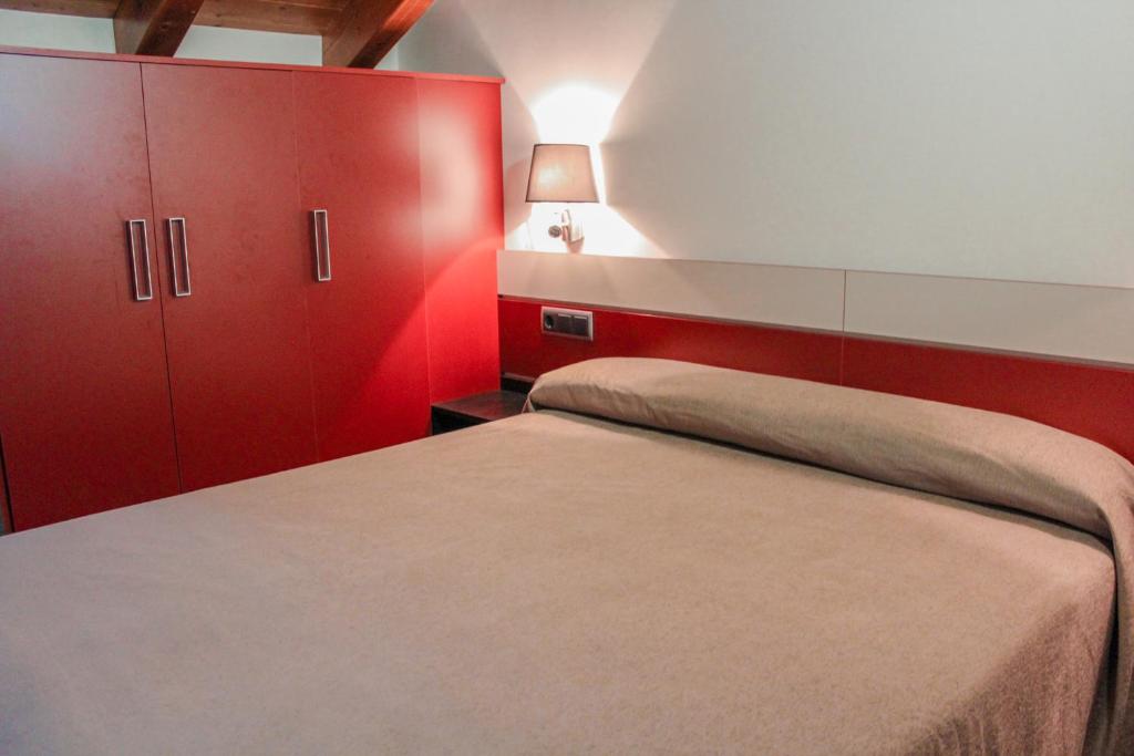 Postel nebo postele na pokoji v ubytování Hotel Saloria