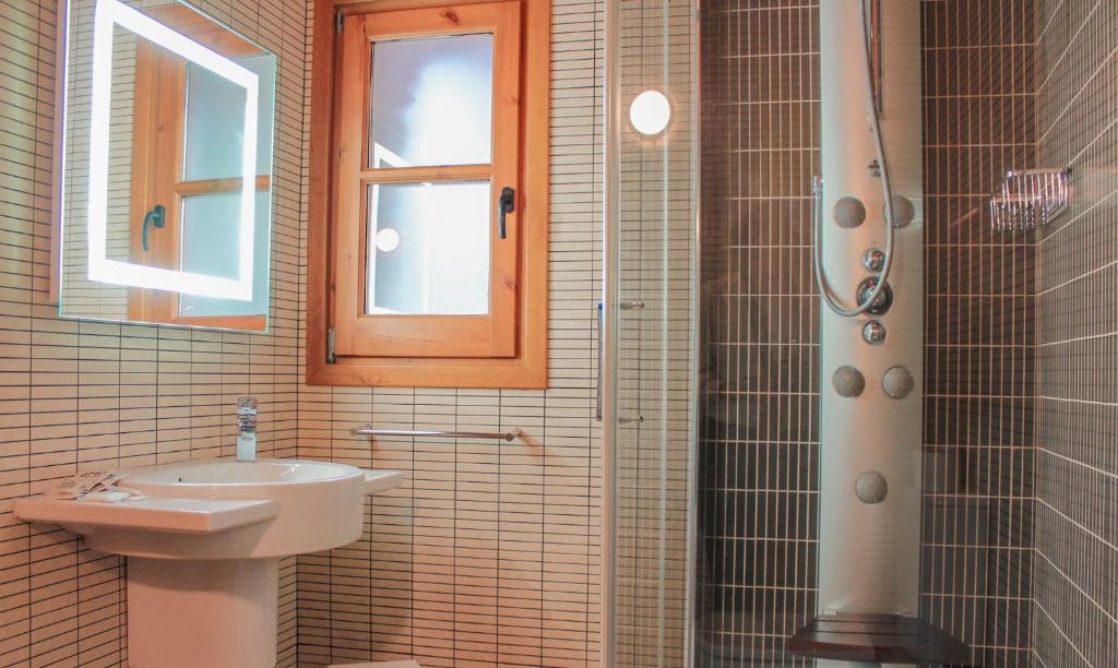 Koupelna v ubytování Hotel Saloria