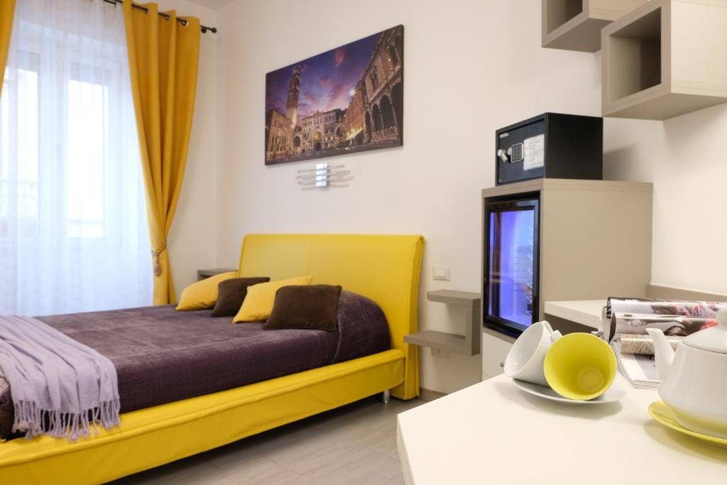 Postel nebo postele na pokoji v ubytování LeNotti Verona