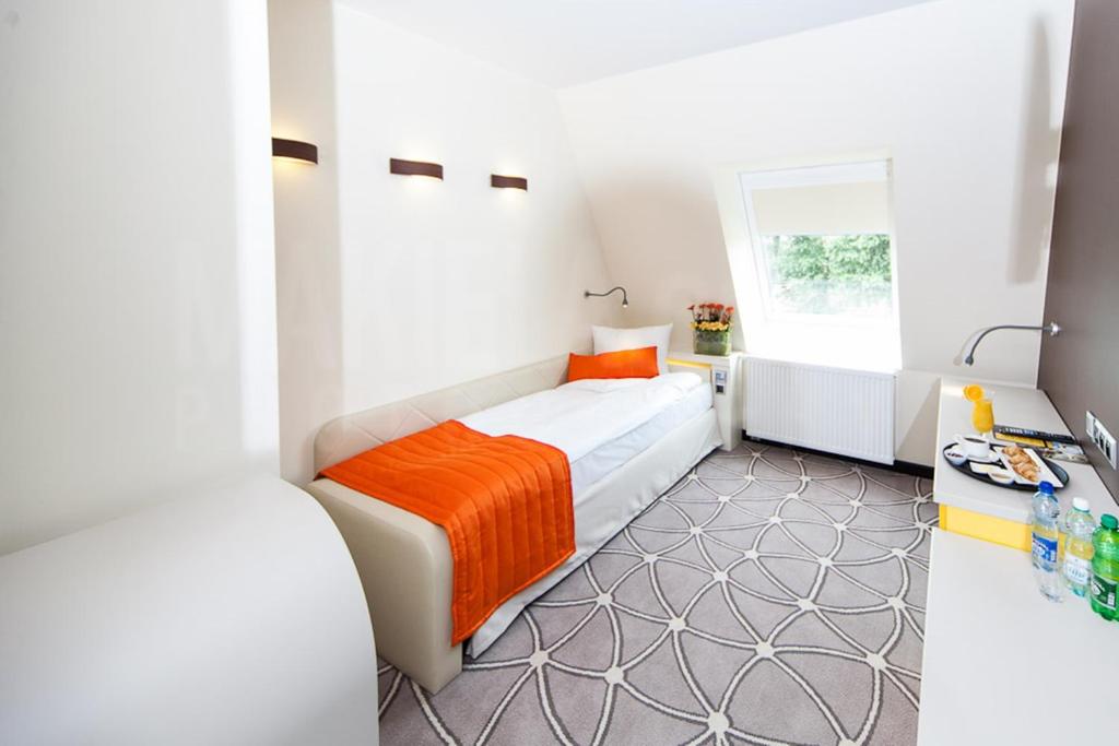 Postel nebo postele na pokoji v ubytování Hotel Eclipse