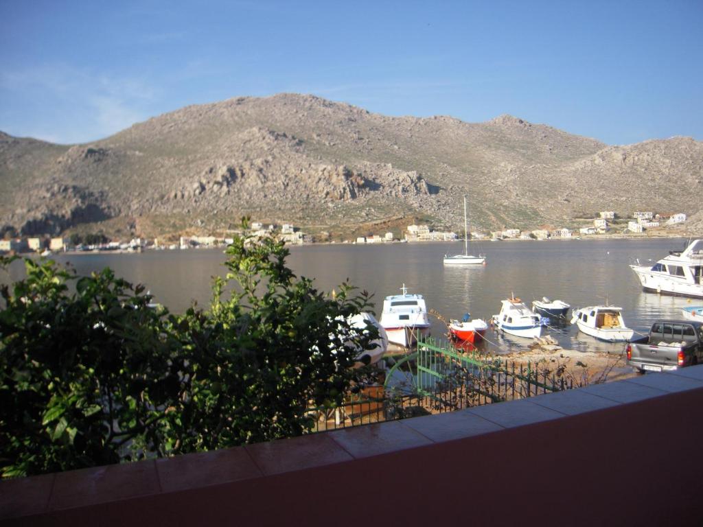 a view of a harbor with boats in the water at Pedi Breeze in Symi