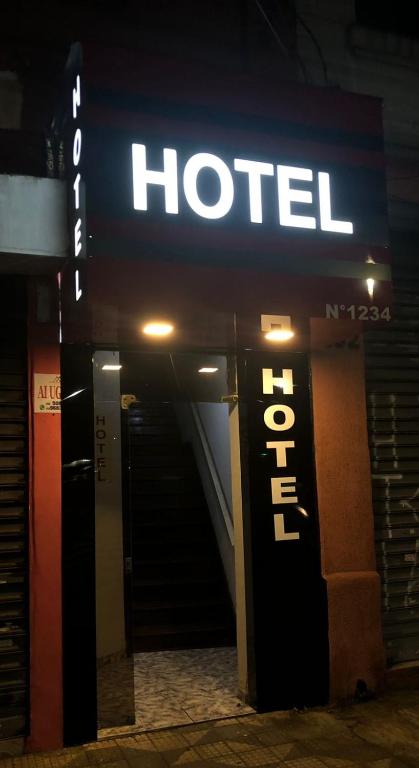a hotel sign on the side of a building at Hotel Popular Vila Mariana in São Paulo