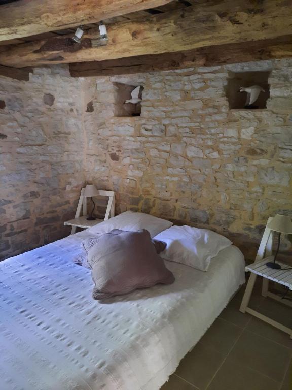 Posteľ alebo postele v izbe v ubytovaní Gîte du Petit Olivier - 2 à 4 pers -1 chb