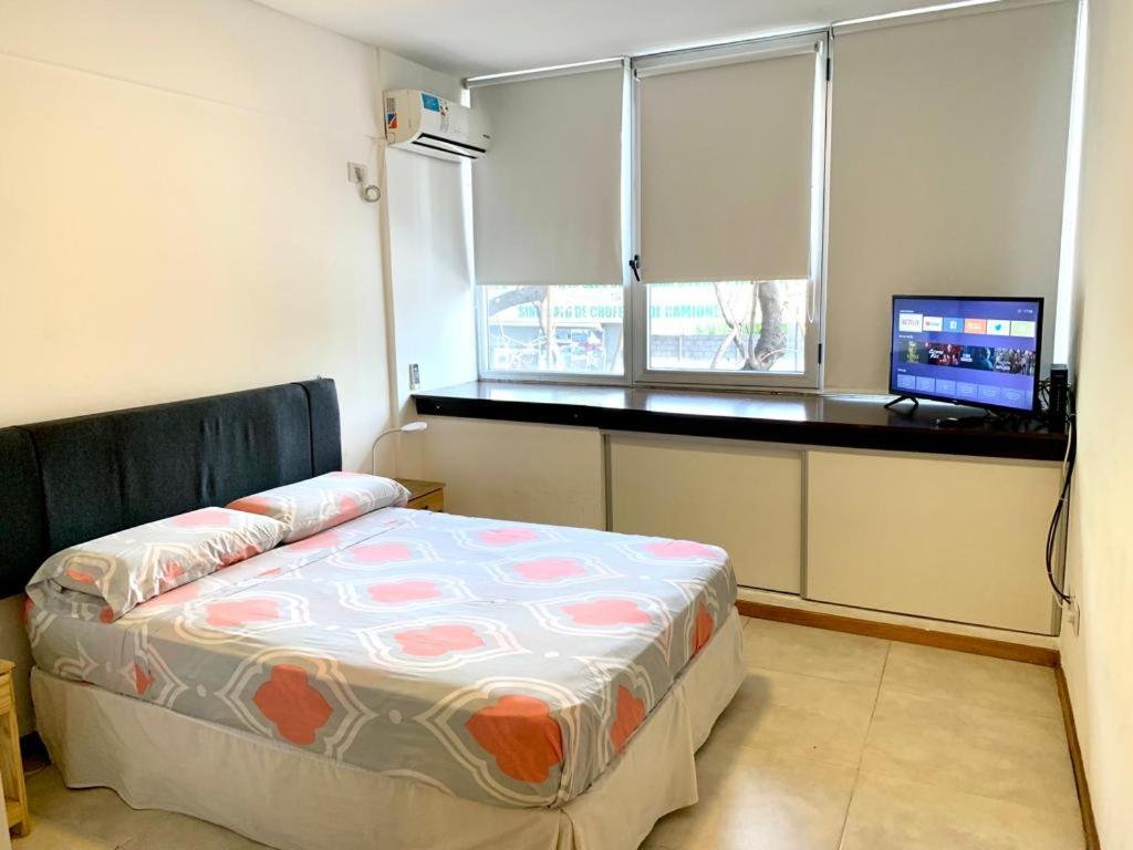 Postel nebo postele na pokoji v ubytování Departamento Independencia