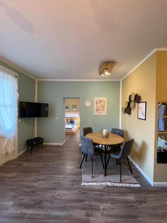 Televízia a/alebo spoločenská miestnosť v ubytovaní BullsLiving Seeapartment 3 AM CORSO
