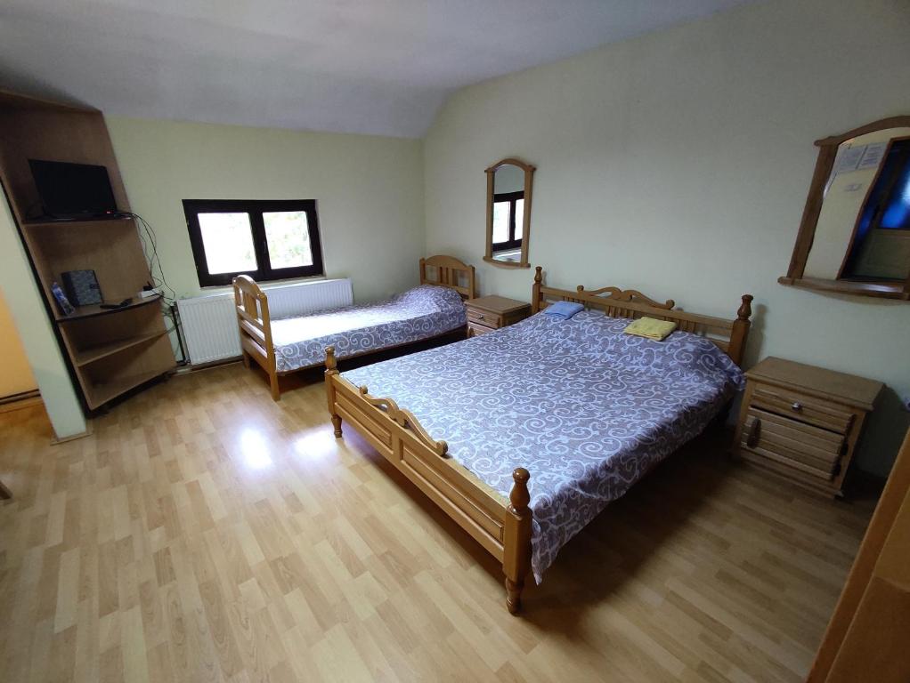 Postel nebo postele na pokoji v ubytování STD "Vila Bor" Stara planina