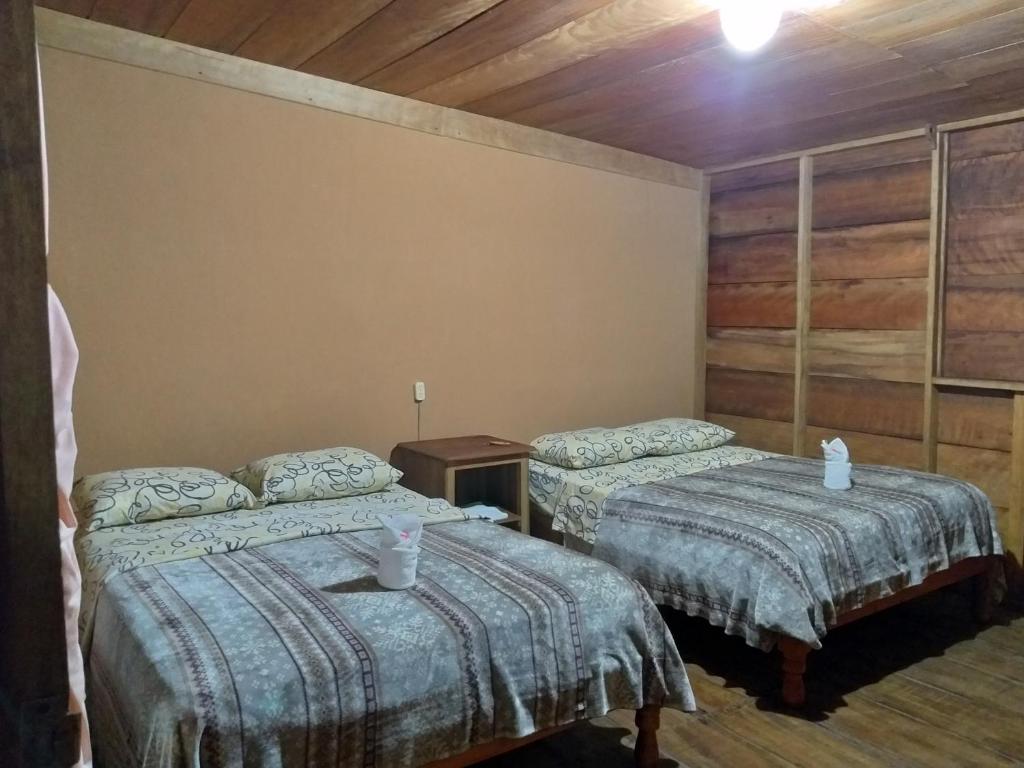 Postel nebo postele na pokoji v ubytování Cabaña Tu´ur