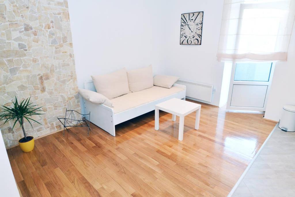 Posezení v ubytování Charming Apartment