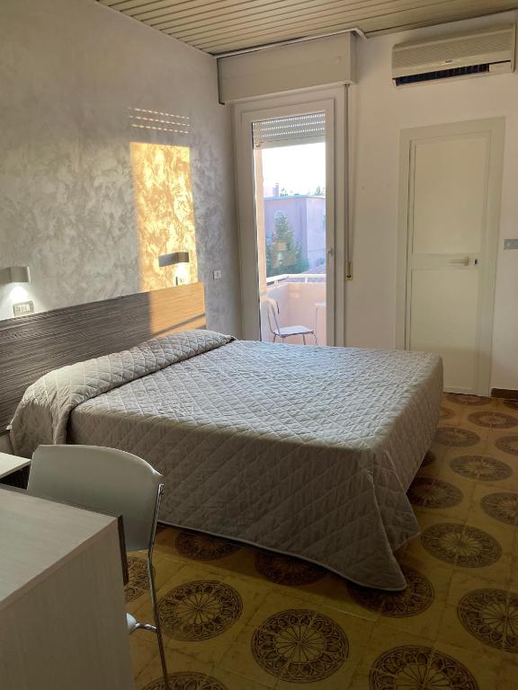 Postel nebo postele na pokoji v ubytování Hotel Adler