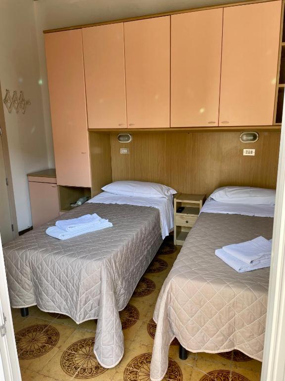 Postel nebo postele na pokoji v ubytování Hotel Adler