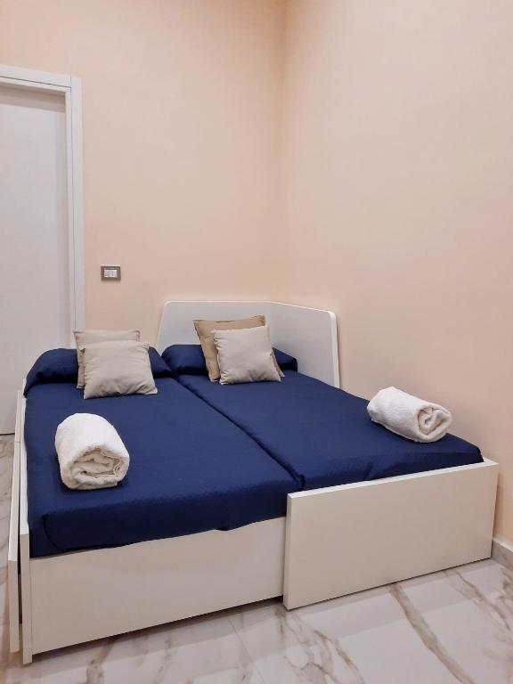 Posteľ alebo postele v izbe v ubytovaní Re Ferdinando Apartment