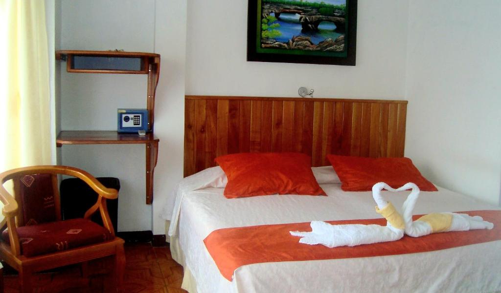 Postel nebo postele na pokoji v ubytování Hotel Sula Sula
