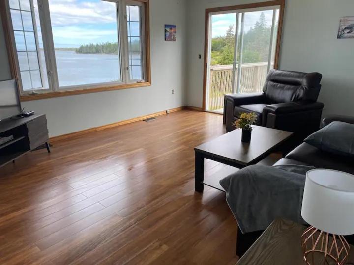 Eastern shore 100 wild Islands Oceanfront Home with hot tub - Housity