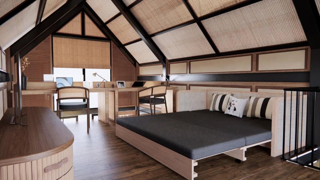 Postel nebo postele na pokoji v ubytování Jawa Jiwa G-Land Resort