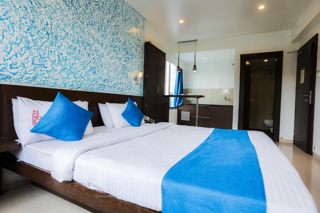 Postel nebo postele na pokoji v ubytování Hotel Solitaire