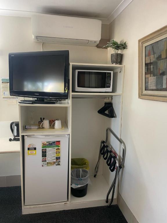 Kuchyň nebo kuchyňský kout v ubytování Kyamba Court Motel