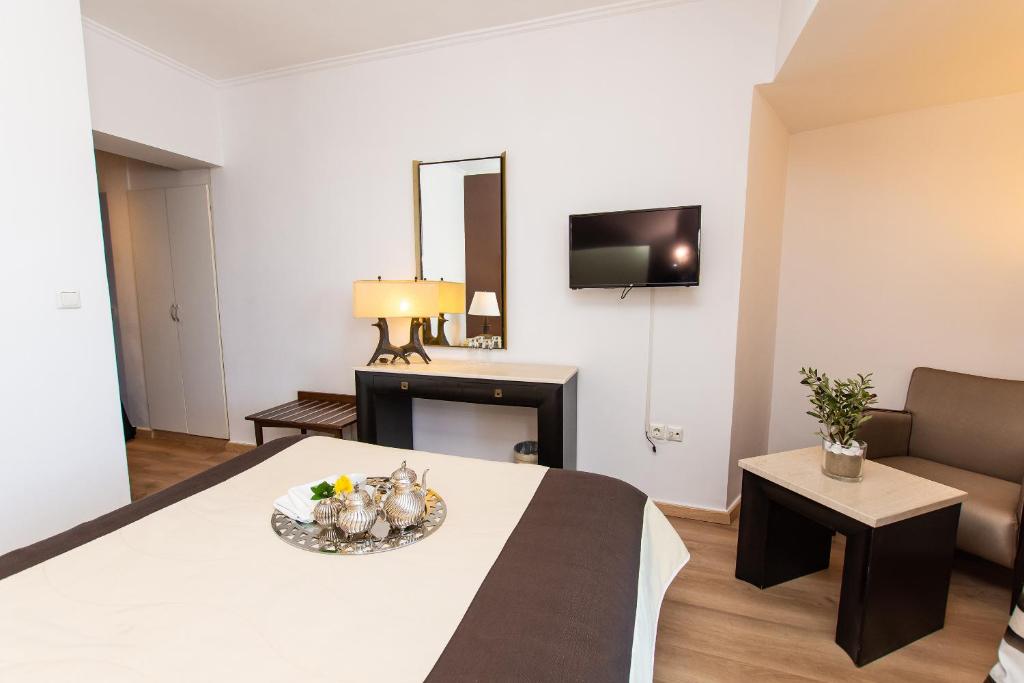 TV a/nebo společenská místnost v ubytování Mati Hotel