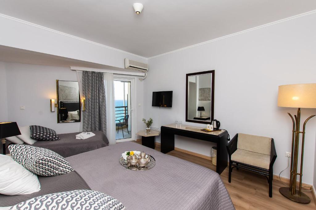 Postel nebo postele na pokoji v ubytování Mati Hotel